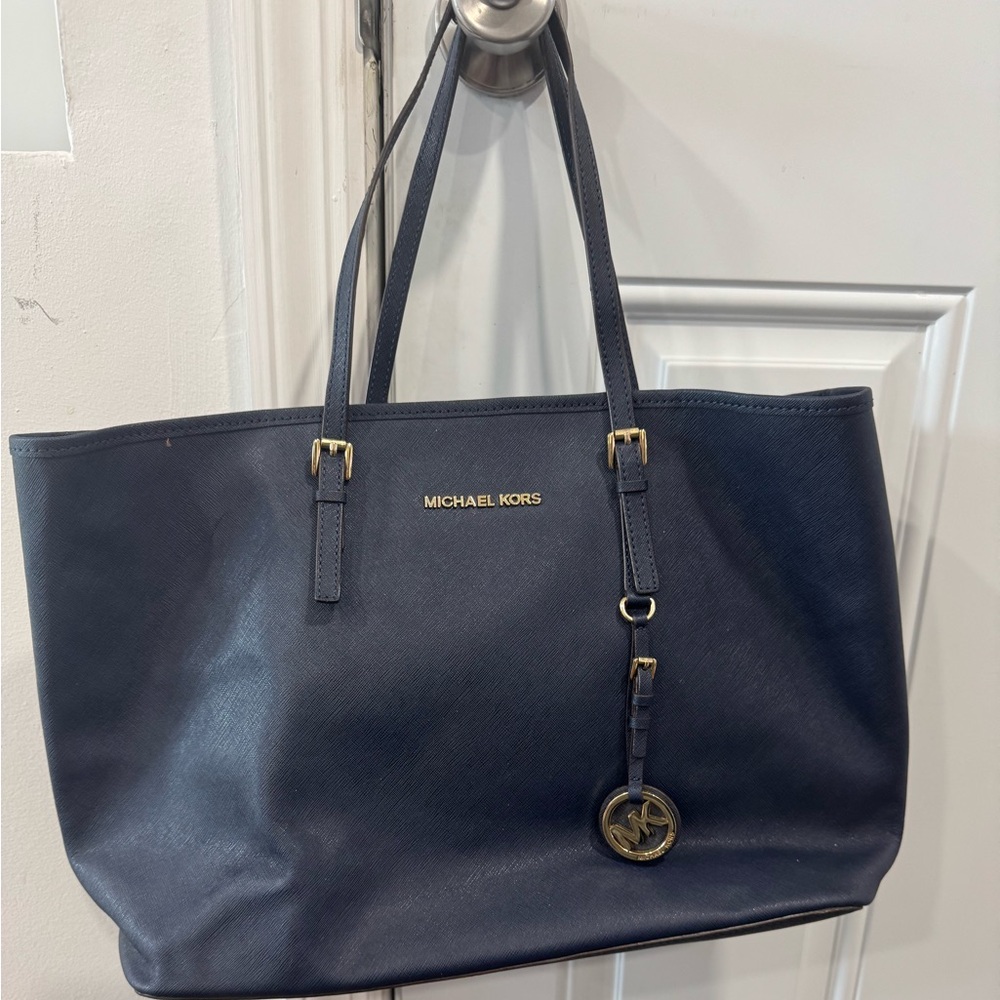 Michael Kors jet set navy blue tote with gold accents
